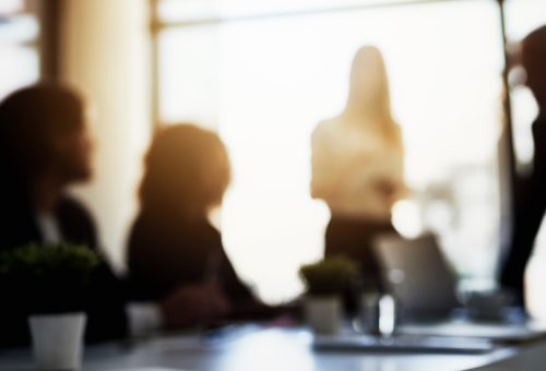 Shot of a group of business colleagues talking together during a meeting in a boardroom