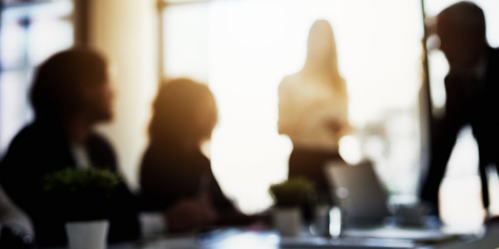 Shot of a group of business colleagues talking together during a meeting in a boardroom